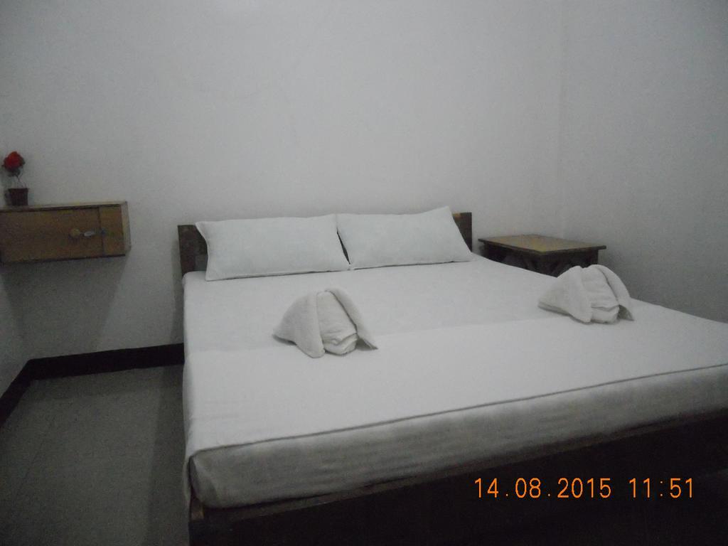 Ashok Homestay Ель-Нідо Номер фото